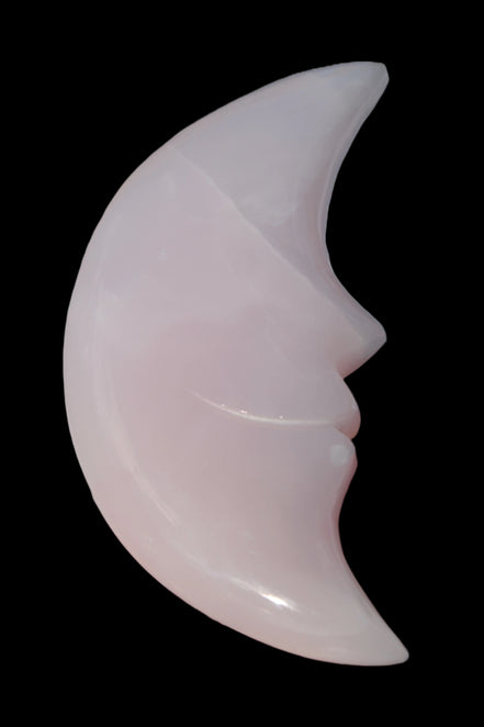 Mangano Calcite smiling Crescent Moon 70*132.22mm 331g in sunlight  - Rocks and Things Store