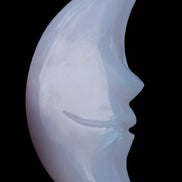 Mangano Calcite smiling Crescent Moon 70*132.22mm 331g in sunlight  - Rocks and Things Store