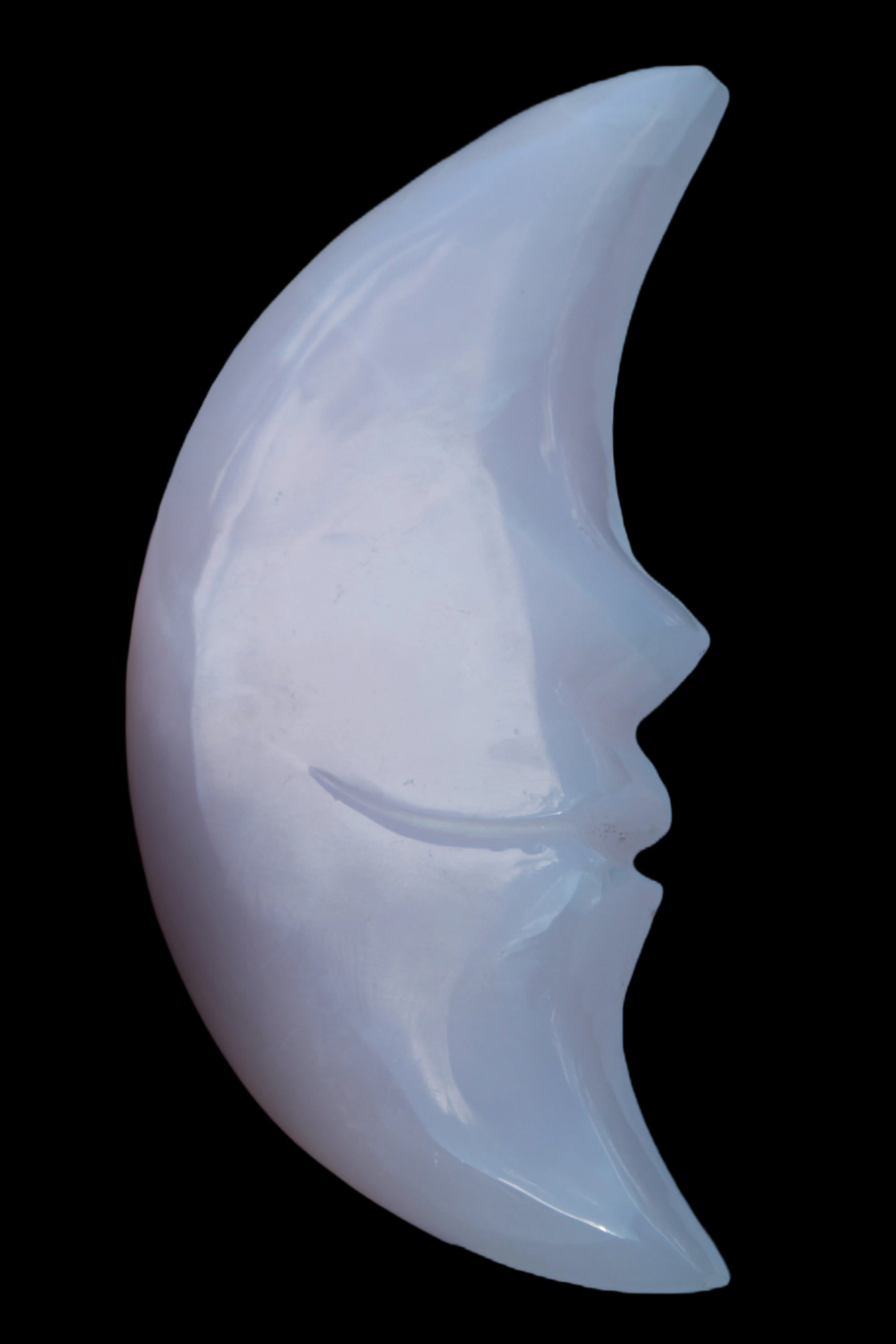 Mangano Calcite smiling Crescent Moon 70*132.22mm 331g in sunlight  - Rocks and Things Store