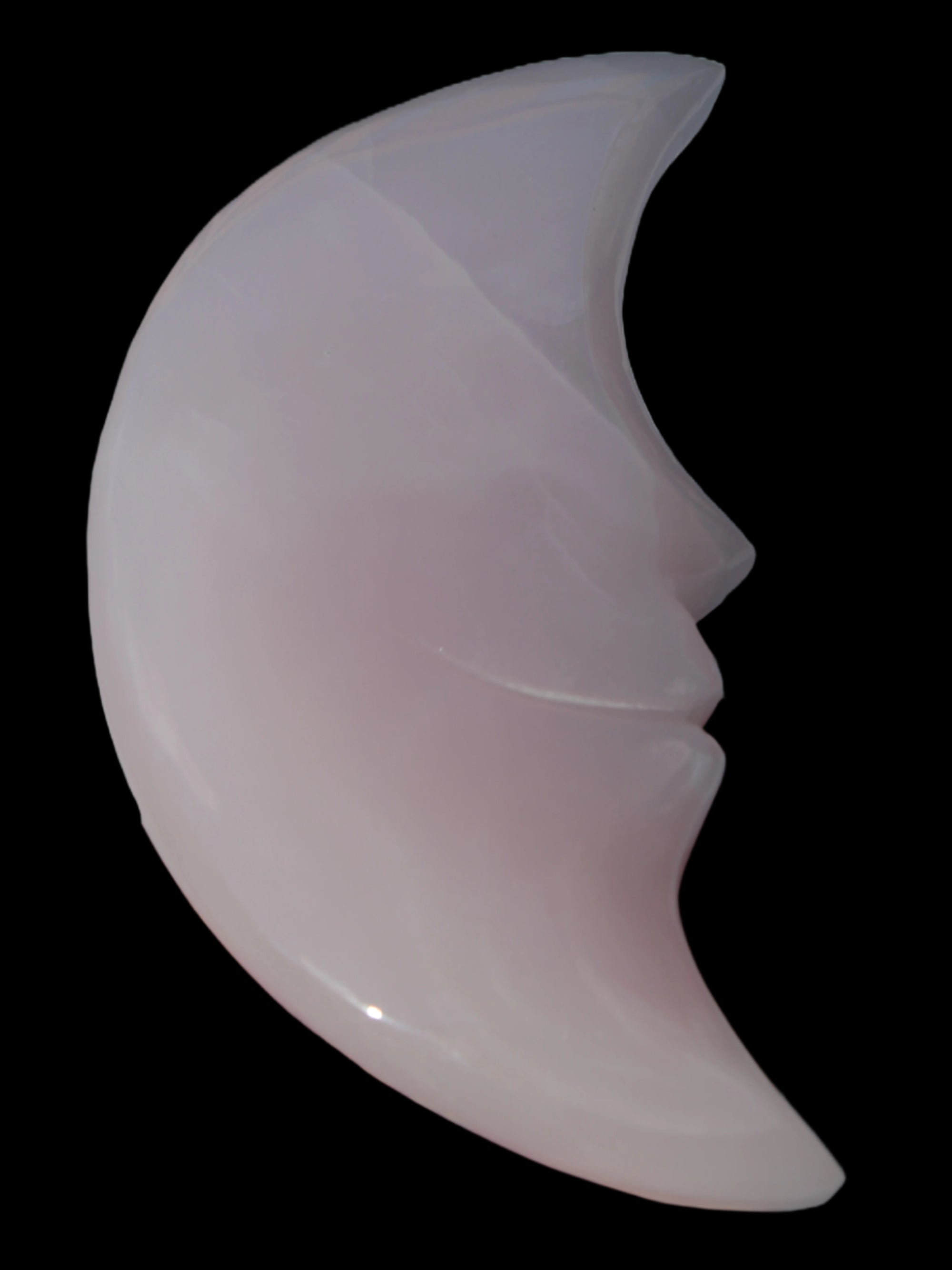 Mangano Calcite smiling Crescent Moon 70*132.22mm 331g in sunlight  - Rocks and Things Store