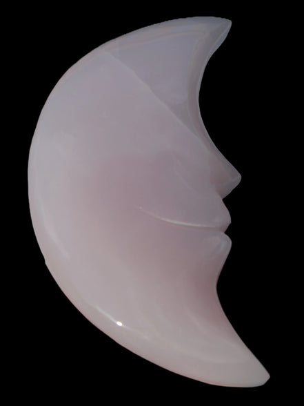 Mangano Calcite smiling Crescent Moon 70*132.22mm 331g in sunlight  - Rocks and Things Store