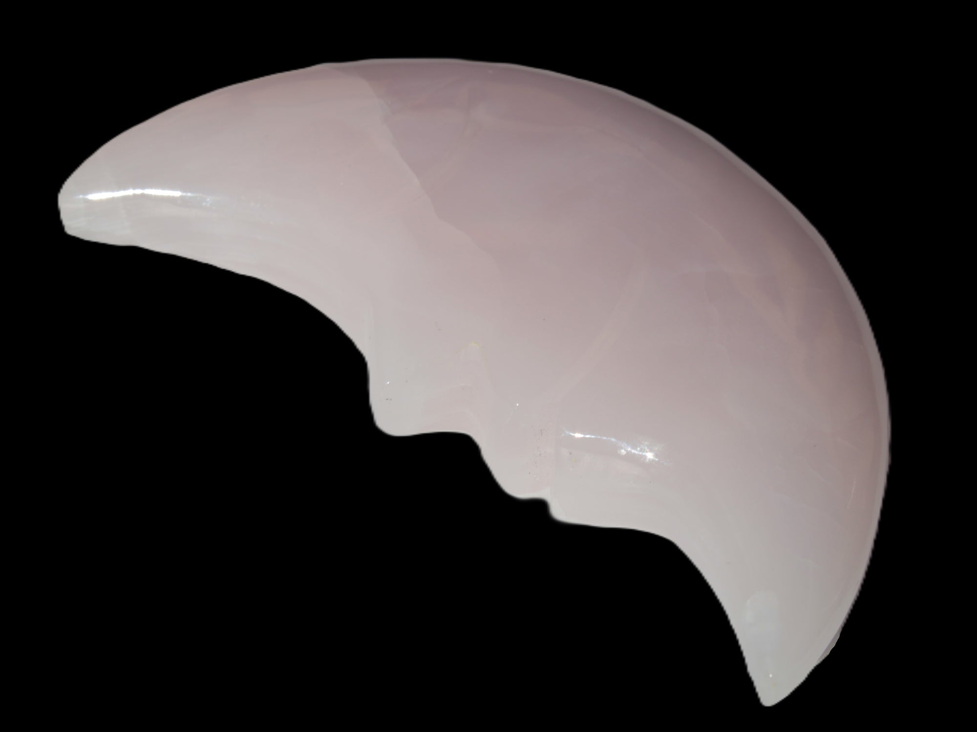 Mangano Calcite smiling Crescent Moon 70*132.22mm 331g in sunlight  - Rocks and Things Store