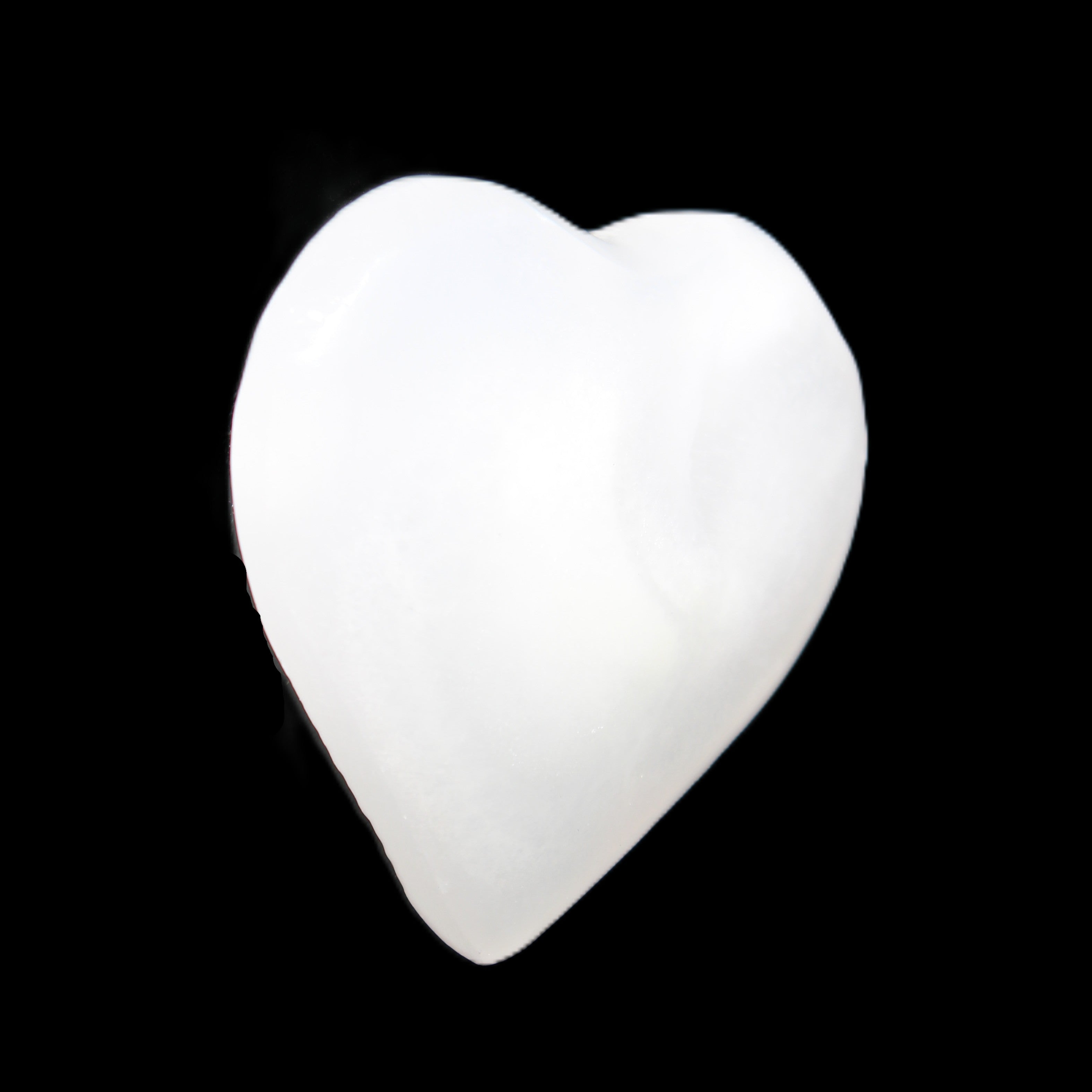Mangano Calcite heart 38mm 20-25g in sunlight - Rocks and Things Store
