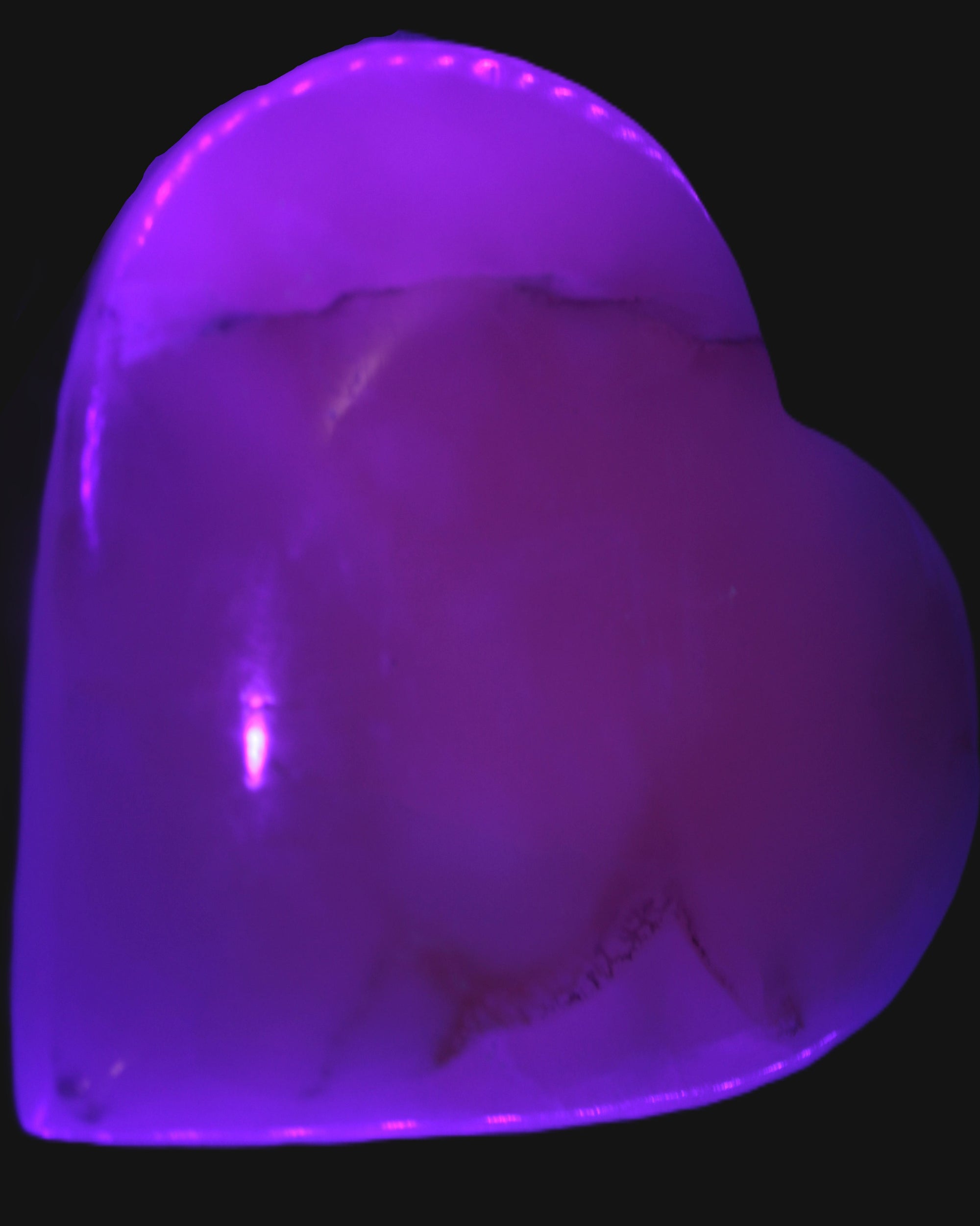 Mangano Calcite heart 38mm 20-25g  in UV light - Rocks and Things Store