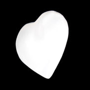 Mangano Calcite heart 38mm 20-25g in sunlight - Rocks and Things Store