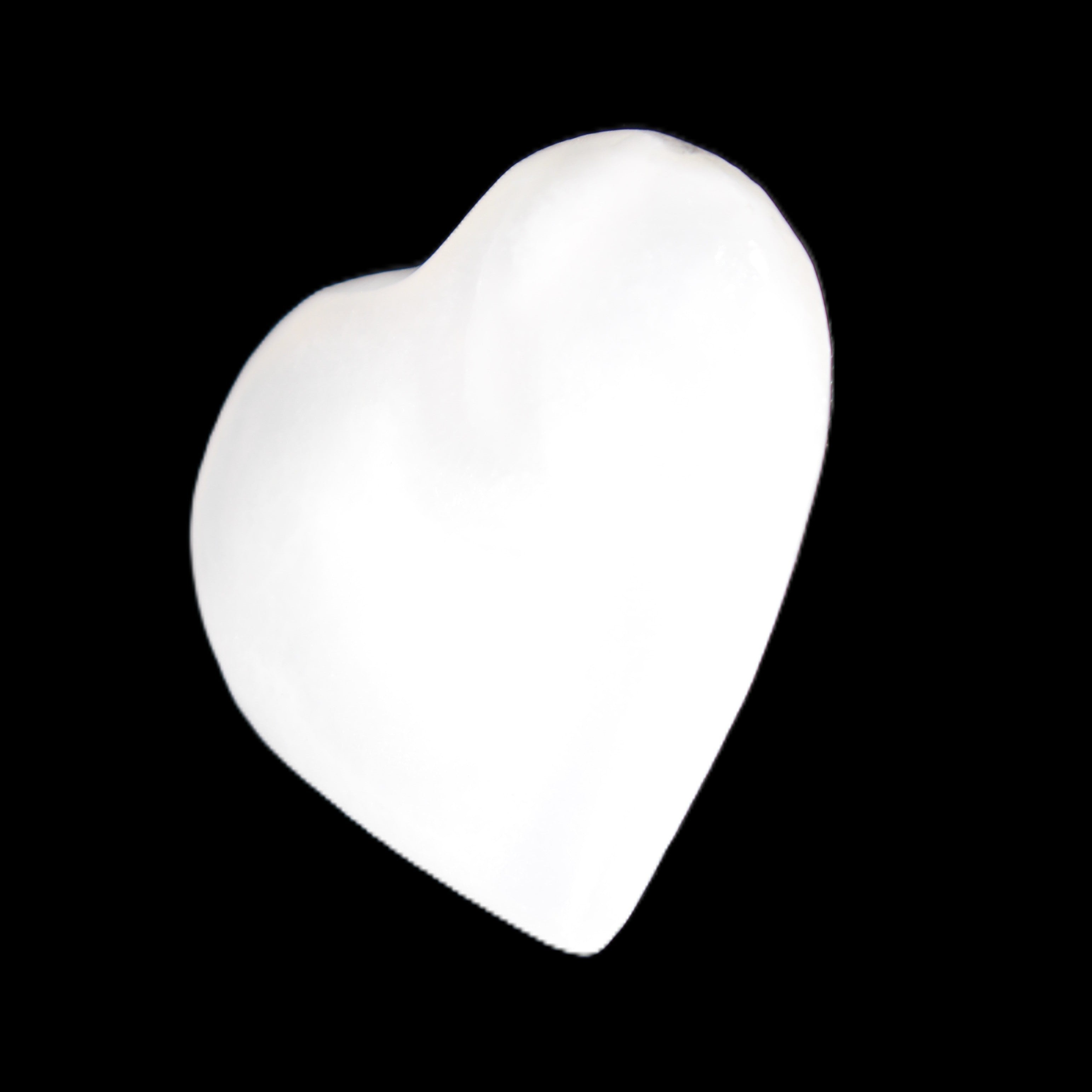 Mangano Calcite heart 38mm 20-25g in sunlight - Rocks and Things Store