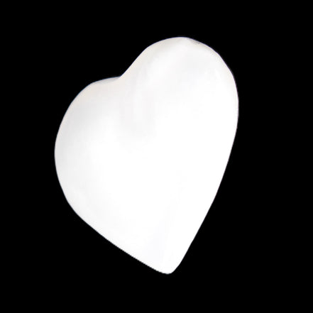 Mangano Calcite heart 38mm 20-25g in sunlight - Rocks and Things Store