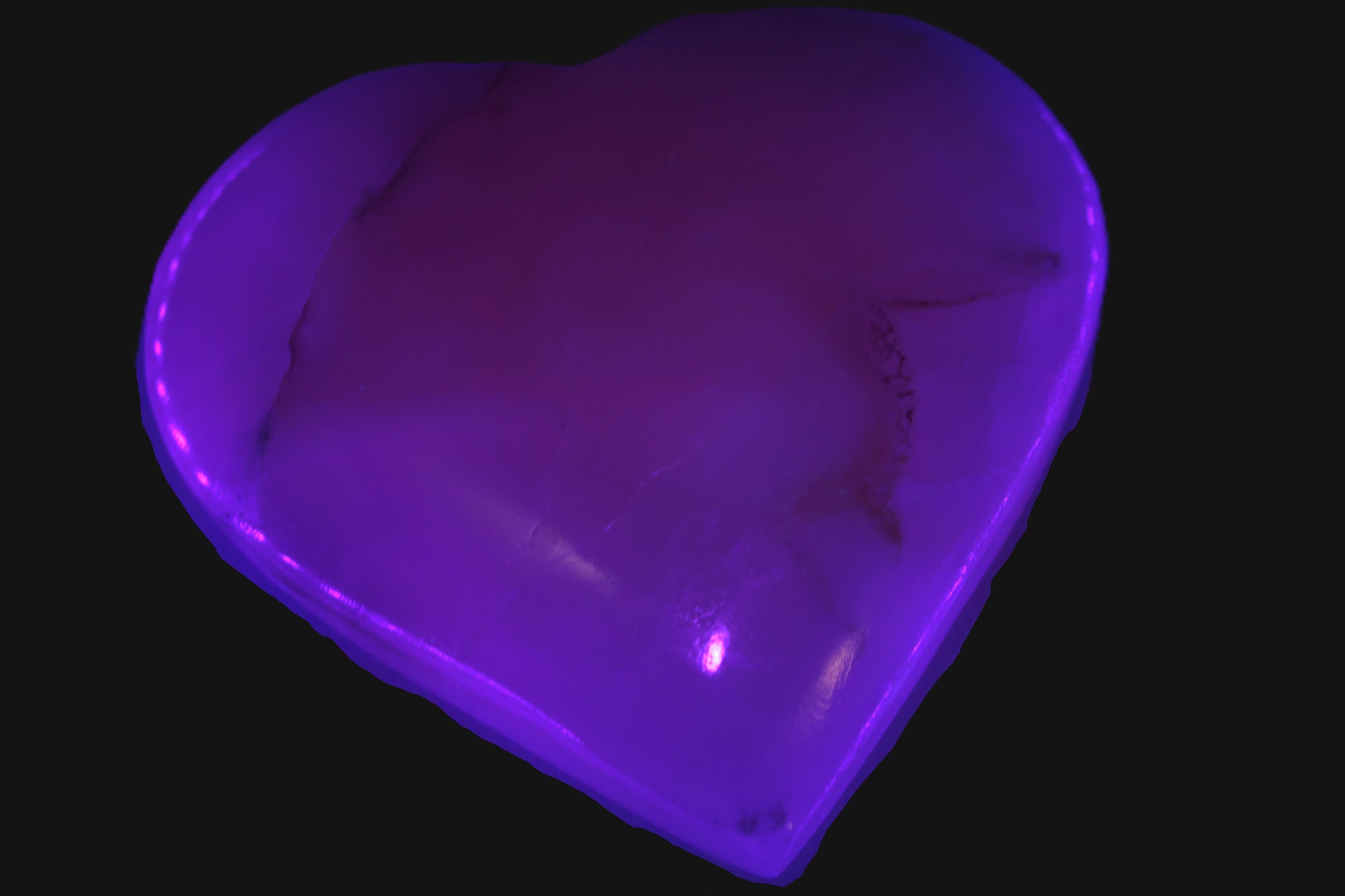 Mangano Calcite heart 38mm 20-25g  in UV light - Rocks and Things Store