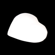 Mangano Calcite heart 38mm 20-25g in sunlight - Rocks and Things Store