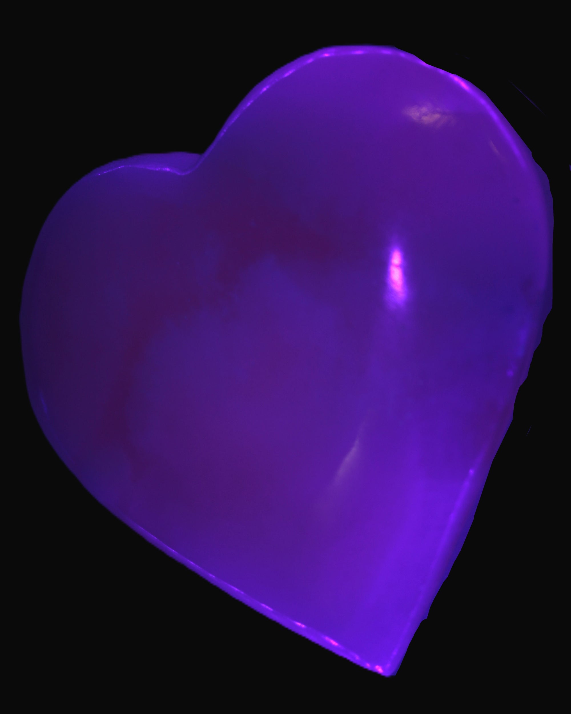 Mangano Calcite heart 38mm 20-25g  in UV light - Rocks and Things Store