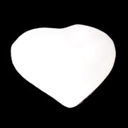 Mangano Calcite heart 38mm 20-25g in sunlight - Rocks and Things Store