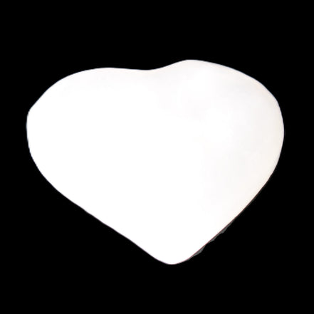 Mangano Calcite heart 38mm 20-25g in sunlight - Rocks and Things Store