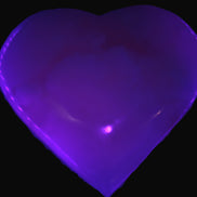Mangano Calcite heart 38mm 20-25g  in UV light - Rocks and Things Store