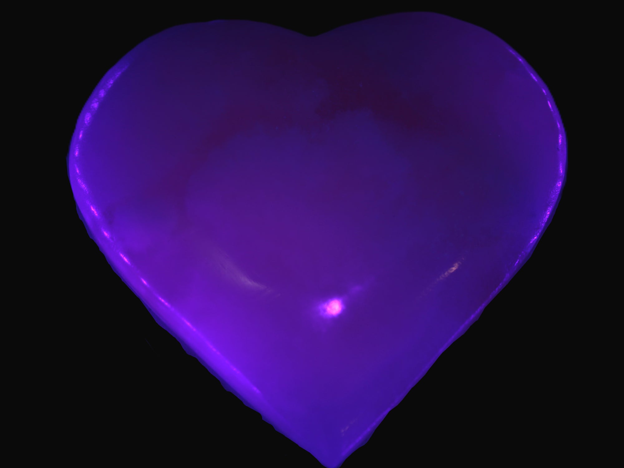 Mangano Calcite heart 38mm 20-25g  in UV light - Rocks and Things Store