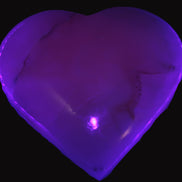 Mangano Calcite heart 38mm 20-25g  in UV light - Rocks and Things Store