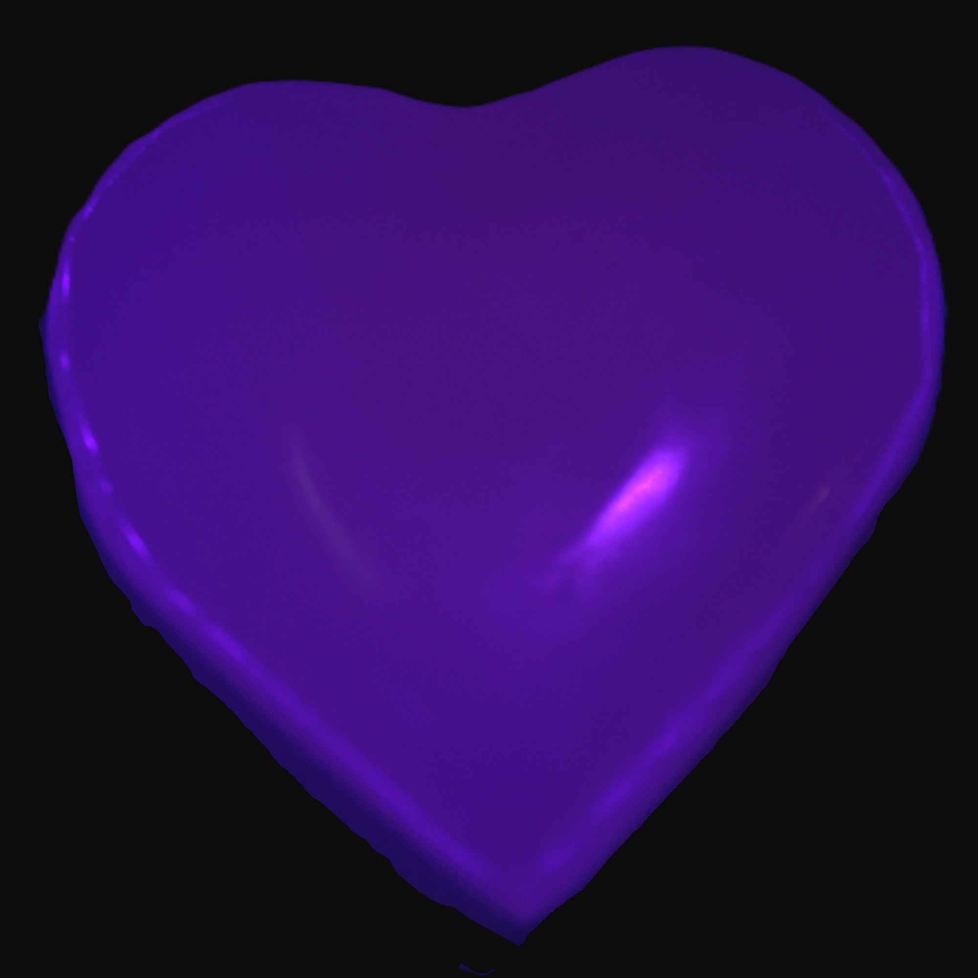 Mangano Calcite heart 38mm 20-25g  in UV light - Rocks and Things Store