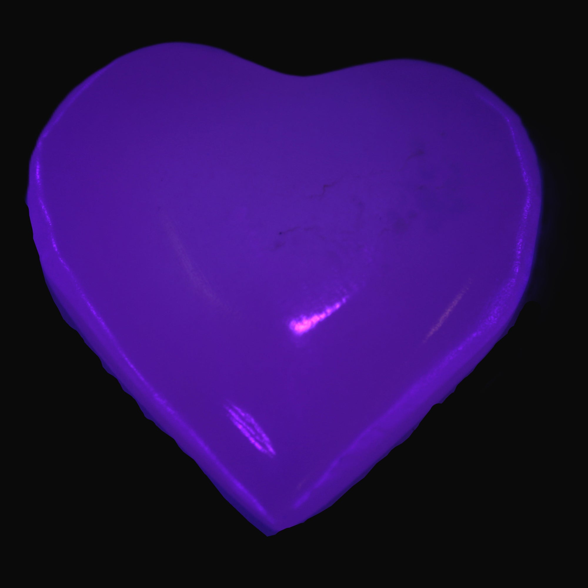 Mangano Calcite heart 38mm 20-25g  in UV light - Rocks and Things Store