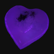 Mangano Calcite heart 38mm 20-25g  in UV light - Rocks and Things Store