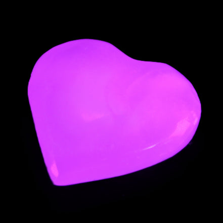 Mangano Calcite heart 38mm 20-25g in sunlight - Rocks and Things Store