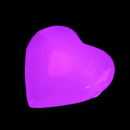 Mangano Calcite heart 38mm 20-25g in sunlight - Rocks and Things Store