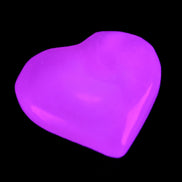 Mangano Calcite heart 38mm 20-25g in sunlight - Rocks and Things Store