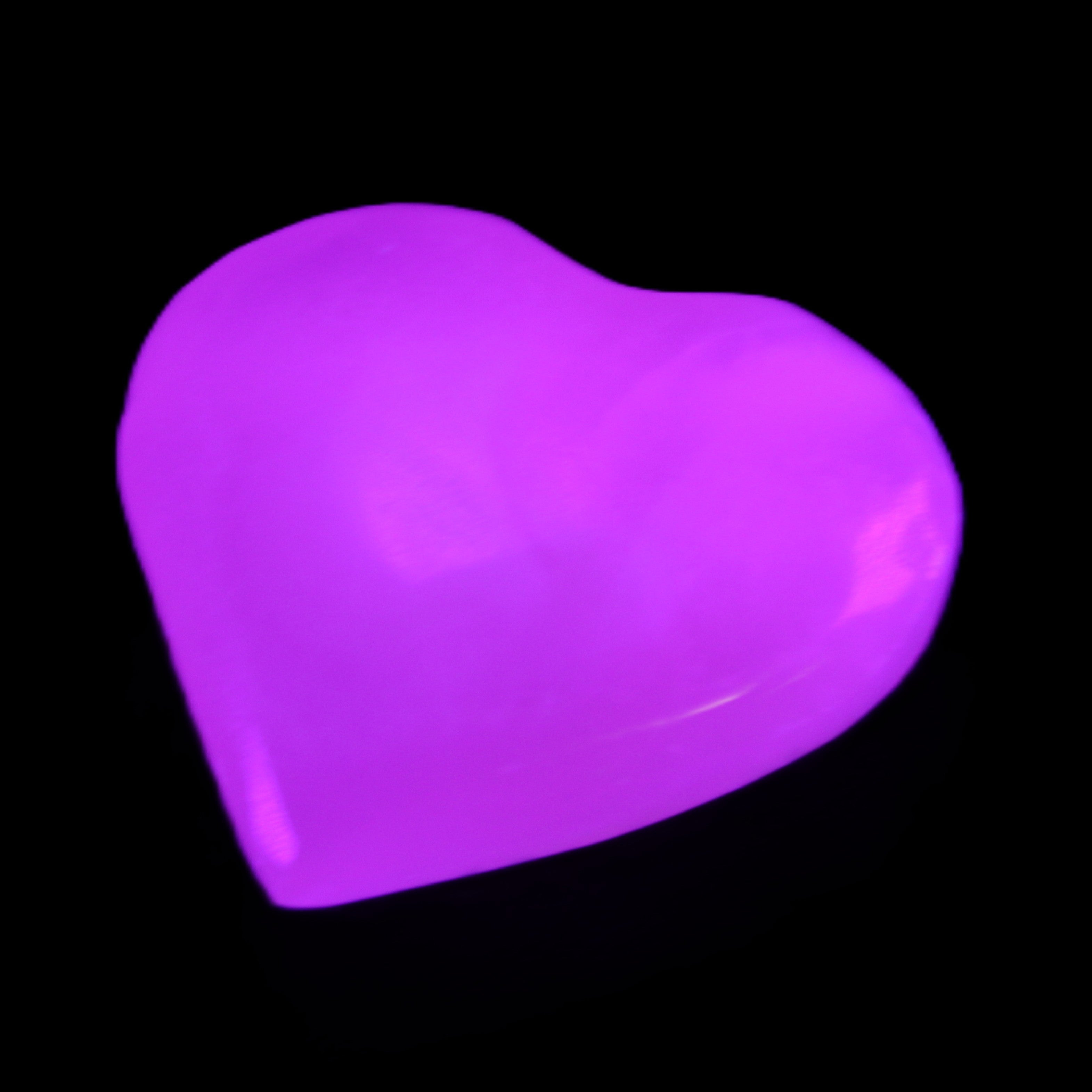Mangano Calcite heart 38mm 20-25g in sunlight - Rocks and Things Store