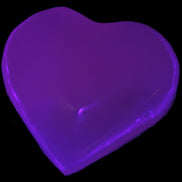 Mangano Calcite UV-reactive heart 38mm 25-30g in UV light - Rocks and Things Store