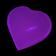 Mangano Calcite UV-reactive heart 38mm 25-30g in UV light - Rocks and Things Store