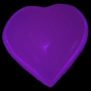 Mangano Calcite UV-reactive heart 38mm 25-30g in UV light - Rocks and Things Store