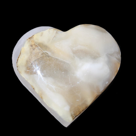 Mangano Calcite hand-carved heart 66/67*64/70mm 130-136g in sunlight - Rocks and Things Store