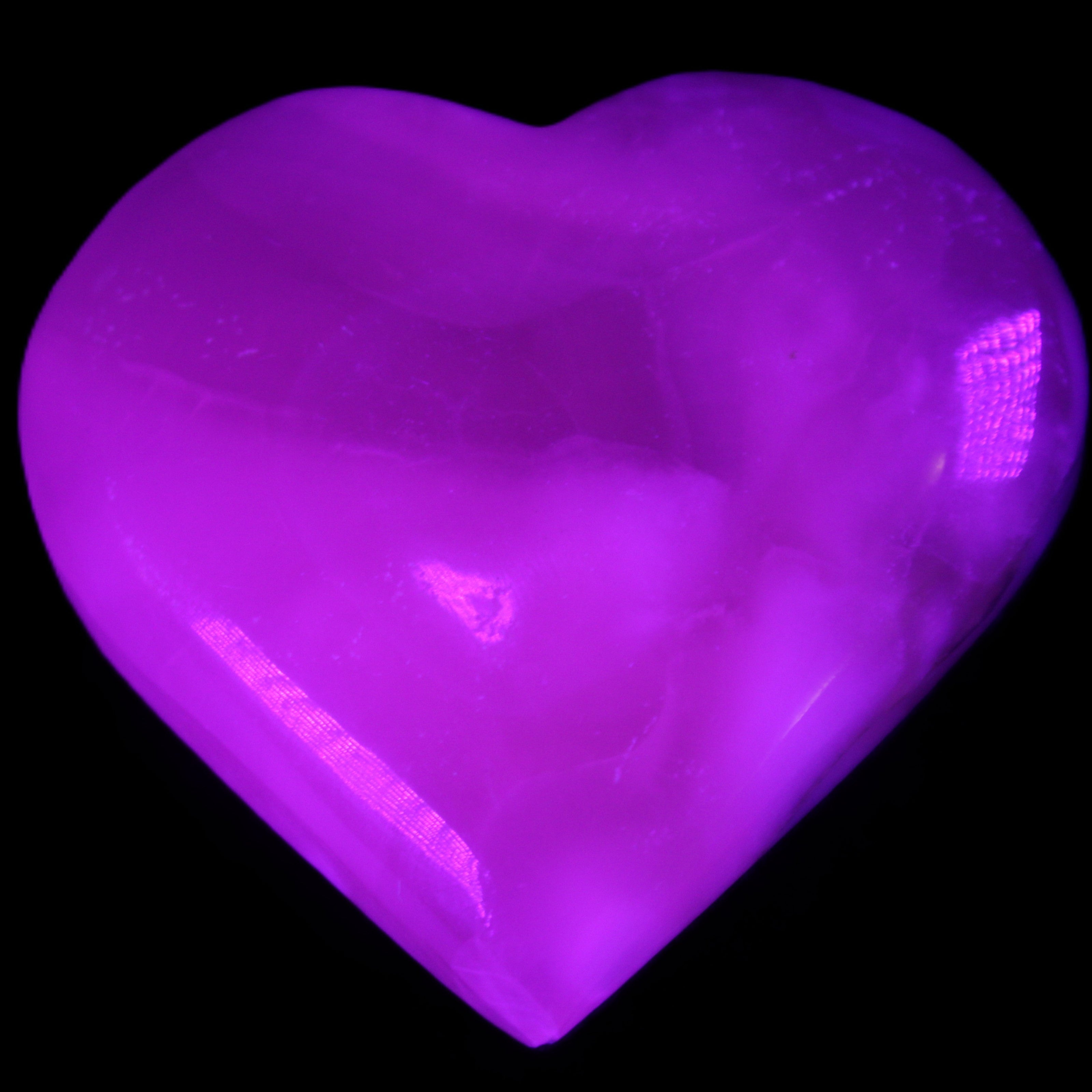 Mangano Calcite hand-carved heart 66/67*64/70mm 130-136g in sunlight - Rocks and Things Store