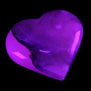 Mangano Calcite hand-carved heart 66/67*64/70mm 130-136g in sunlight - Rocks and Things Store