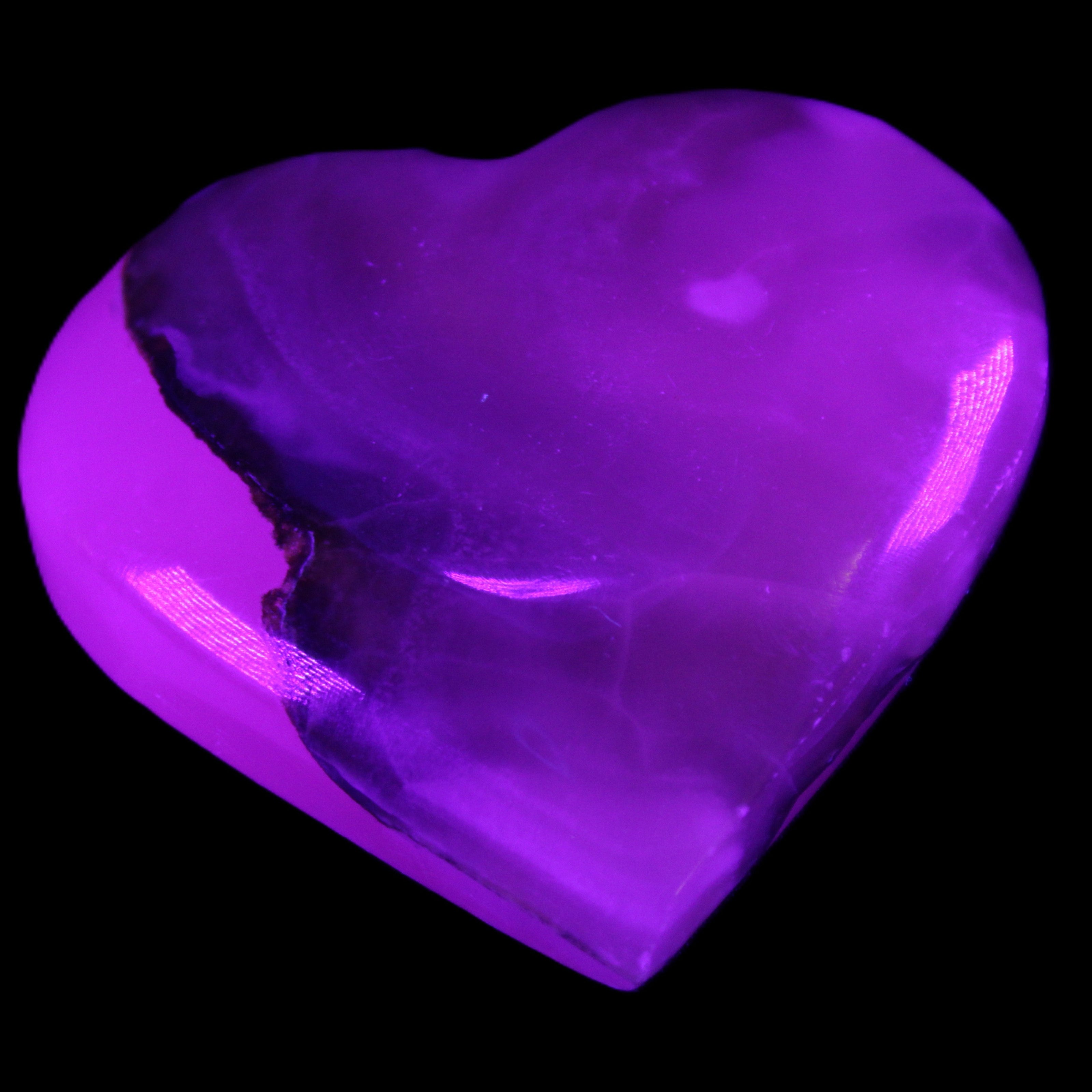 Mangano Calcite hand-carved heart 66/67*64/70mm 130-136g in sunlight - Rocks and Things Store