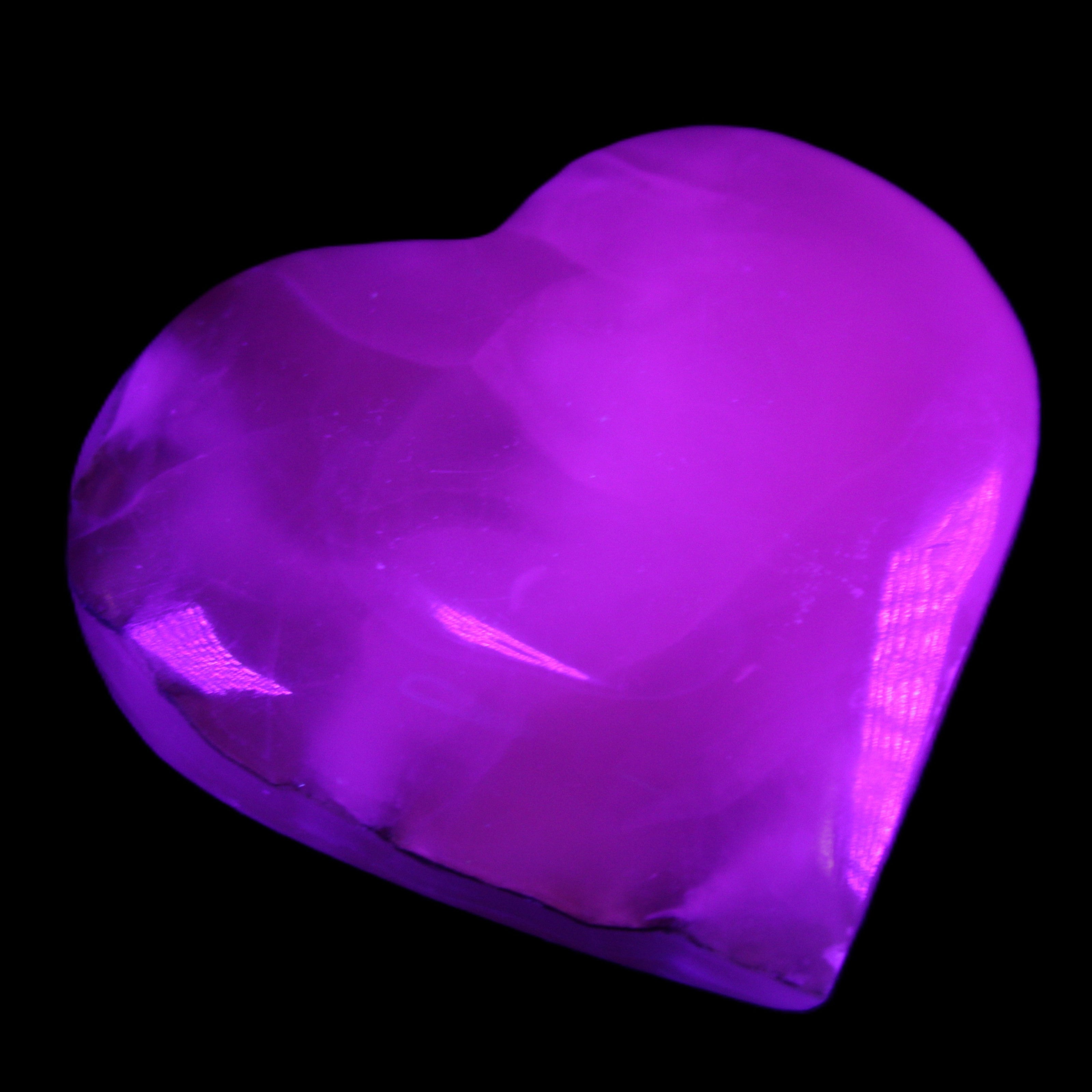 Mangano Calcite hand-carved heart 66/67*64/70mm 130-136g in sunlight - Rocks and Things Store