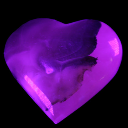 Mangano Calcite hand-carved heart 66/67*64/70mm 130-136g in sunlight - Rocks and Things Store