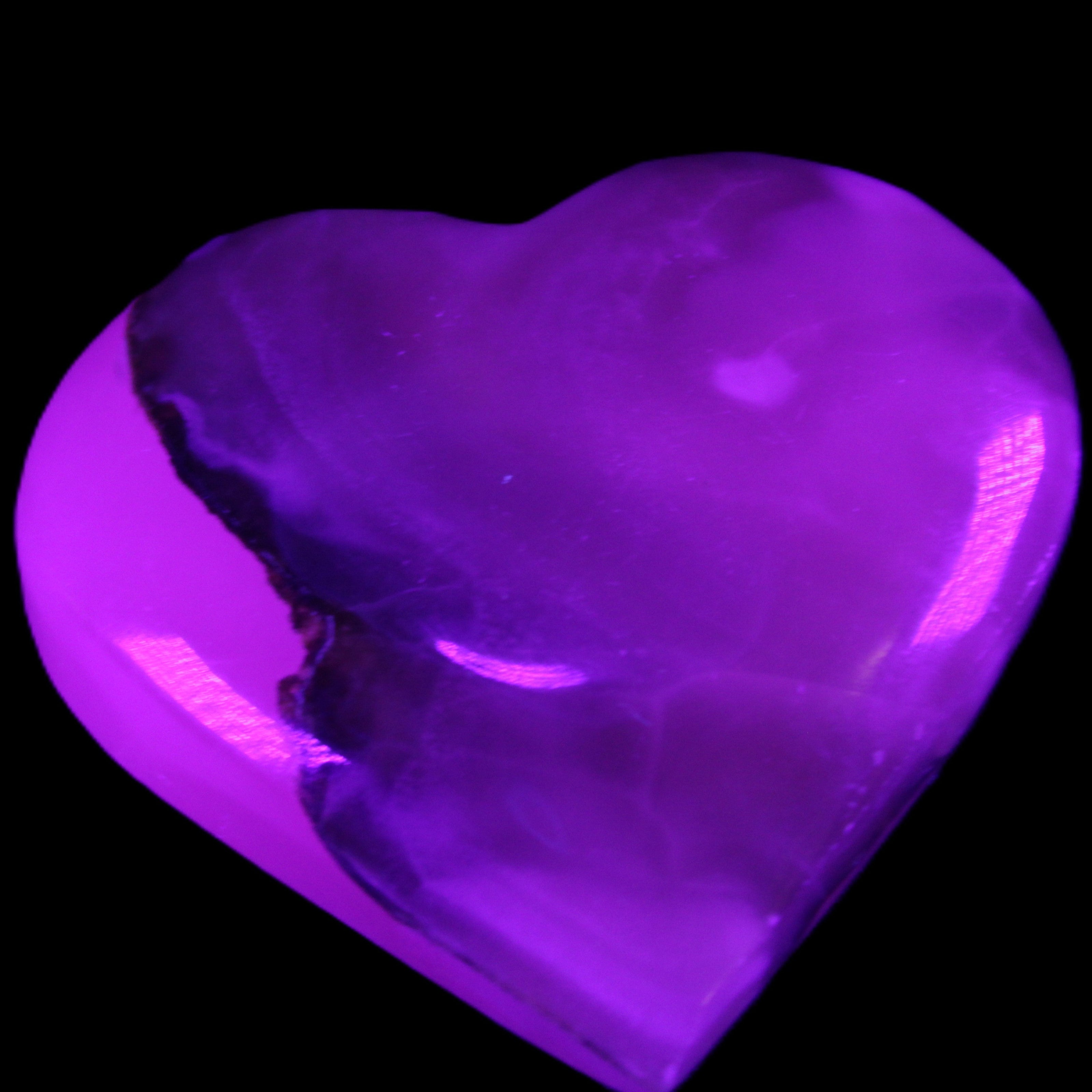 Mangano Calcite hand-carved heart 66/67*64/70mm 130-136g in sunlight - Rocks and Things Store