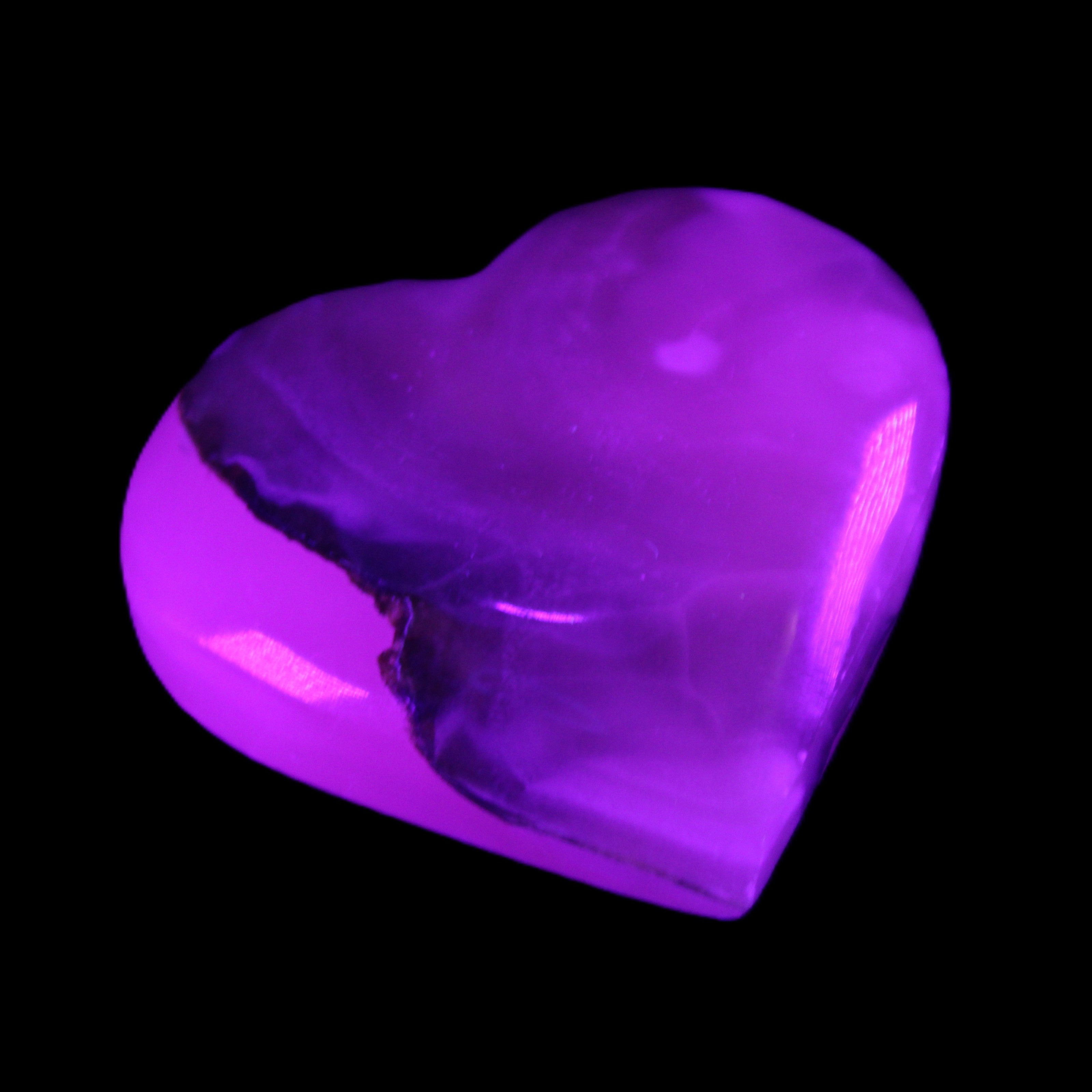 Mangano Calcite hand-carved heart 66/67*64/70mm 130-136g in sunlight - Rocks and Things Store