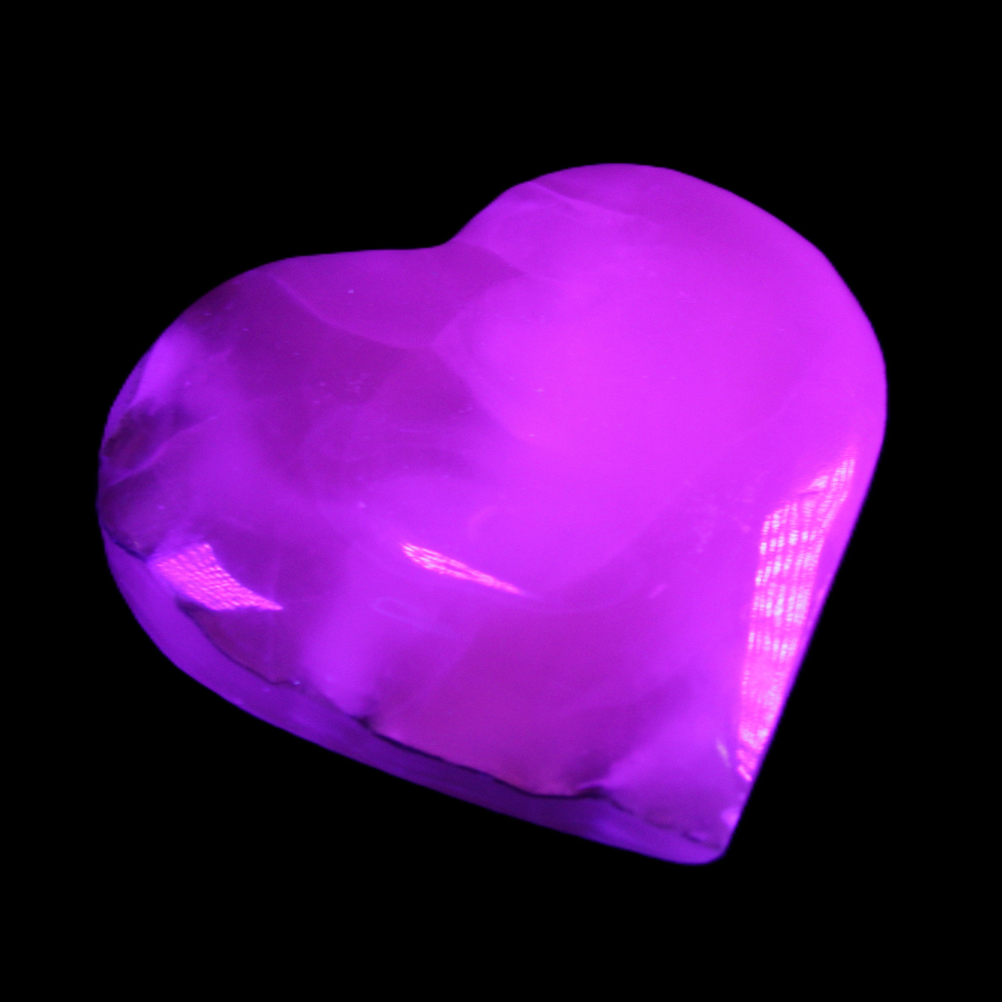 Mangano Calcite hand-carved heart 66/67*64/70mm 130-136g in sunlight - Rocks and Things Store