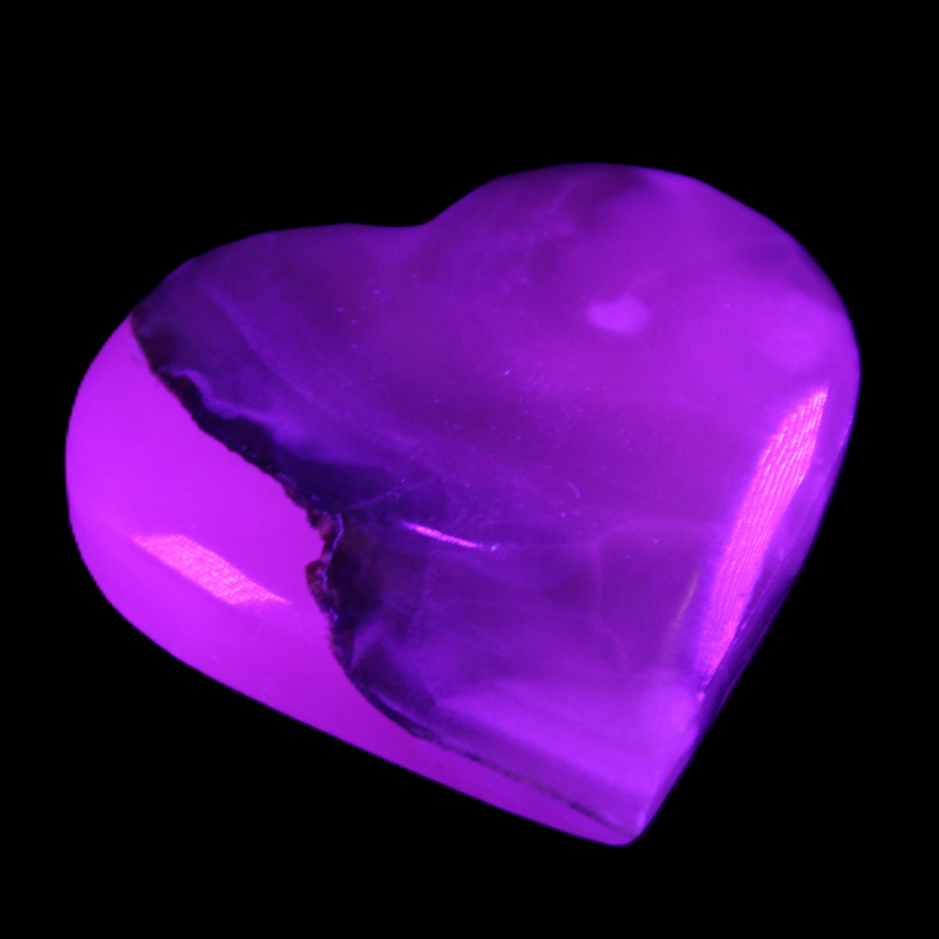 Mangano Calcite hand-carved heart 66/67*64/70mm 130-136g in sunlight - Rocks and Things Store