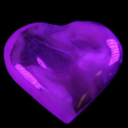 Mangano Calcite hand-carved heart 66/67*64/70mm 130-136g in sunlight - Rocks and Things Store