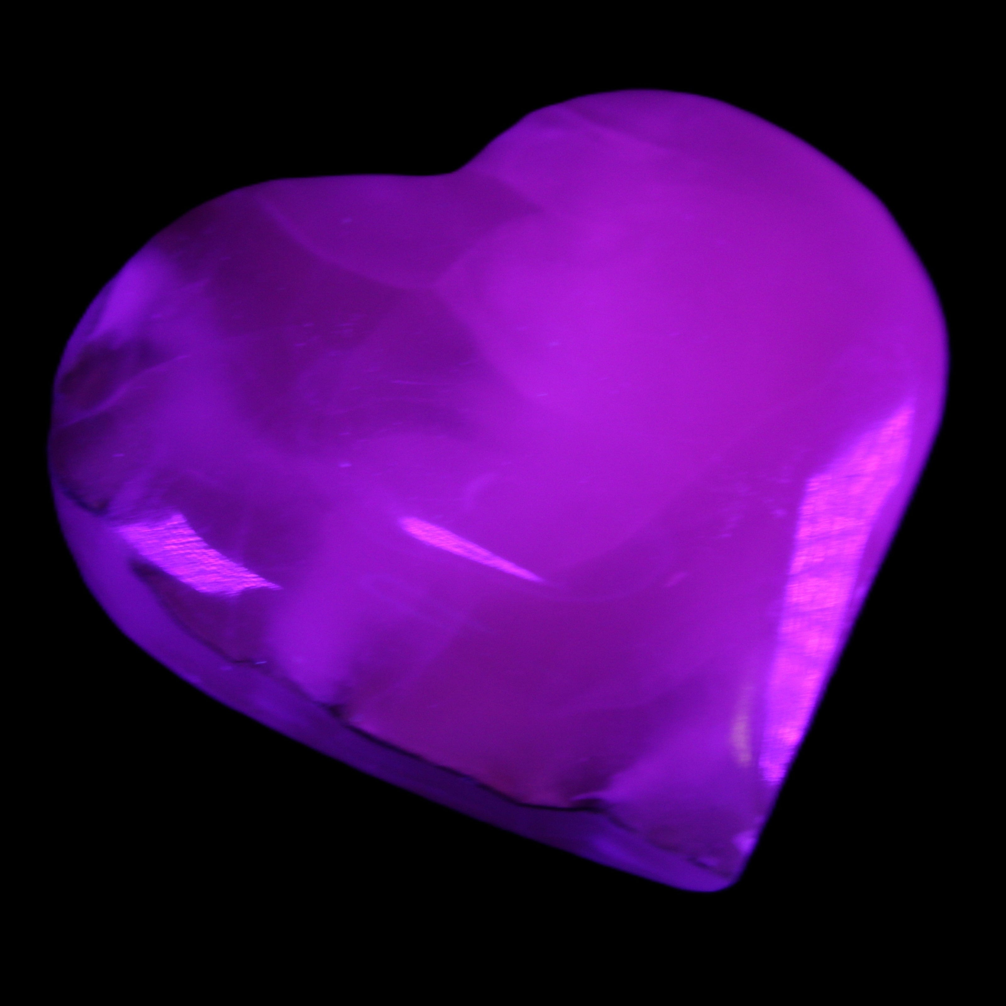 Mangano Calcite hand-carved heart 66/67*64/70mm 130-136g in sunlight - Rocks and Things Store