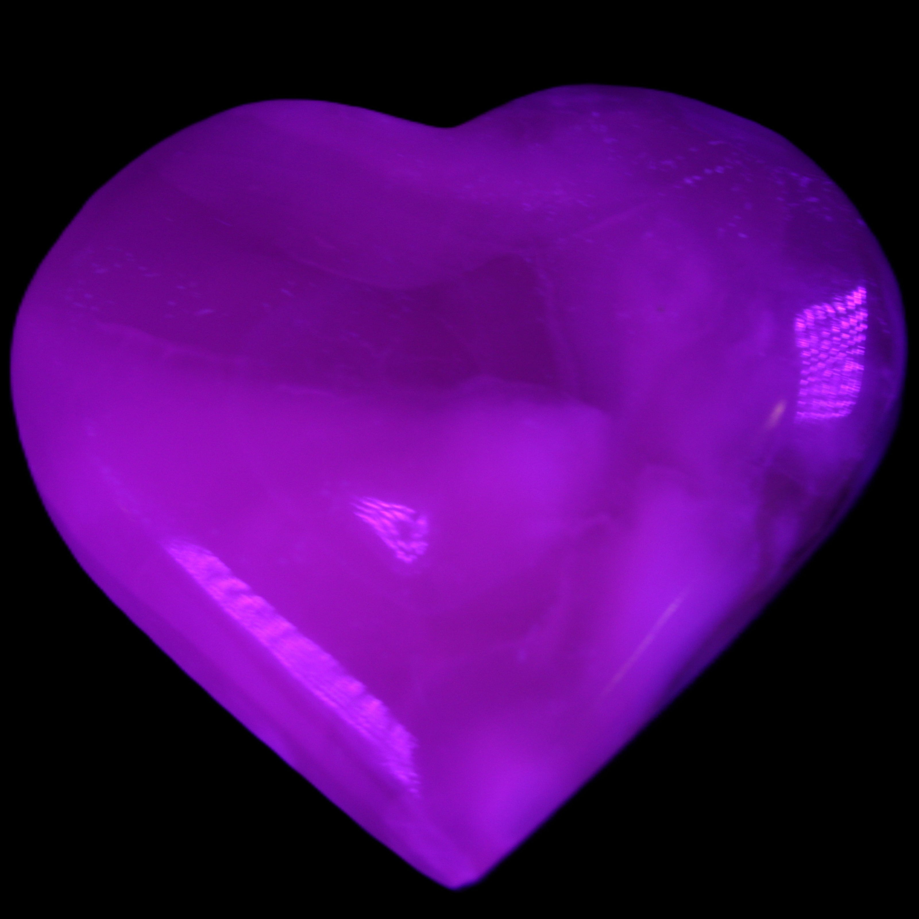 Mangano Calcite hand-carved heart 66/67*64/70mm 130-136g in sunlight - Rocks and Things Store