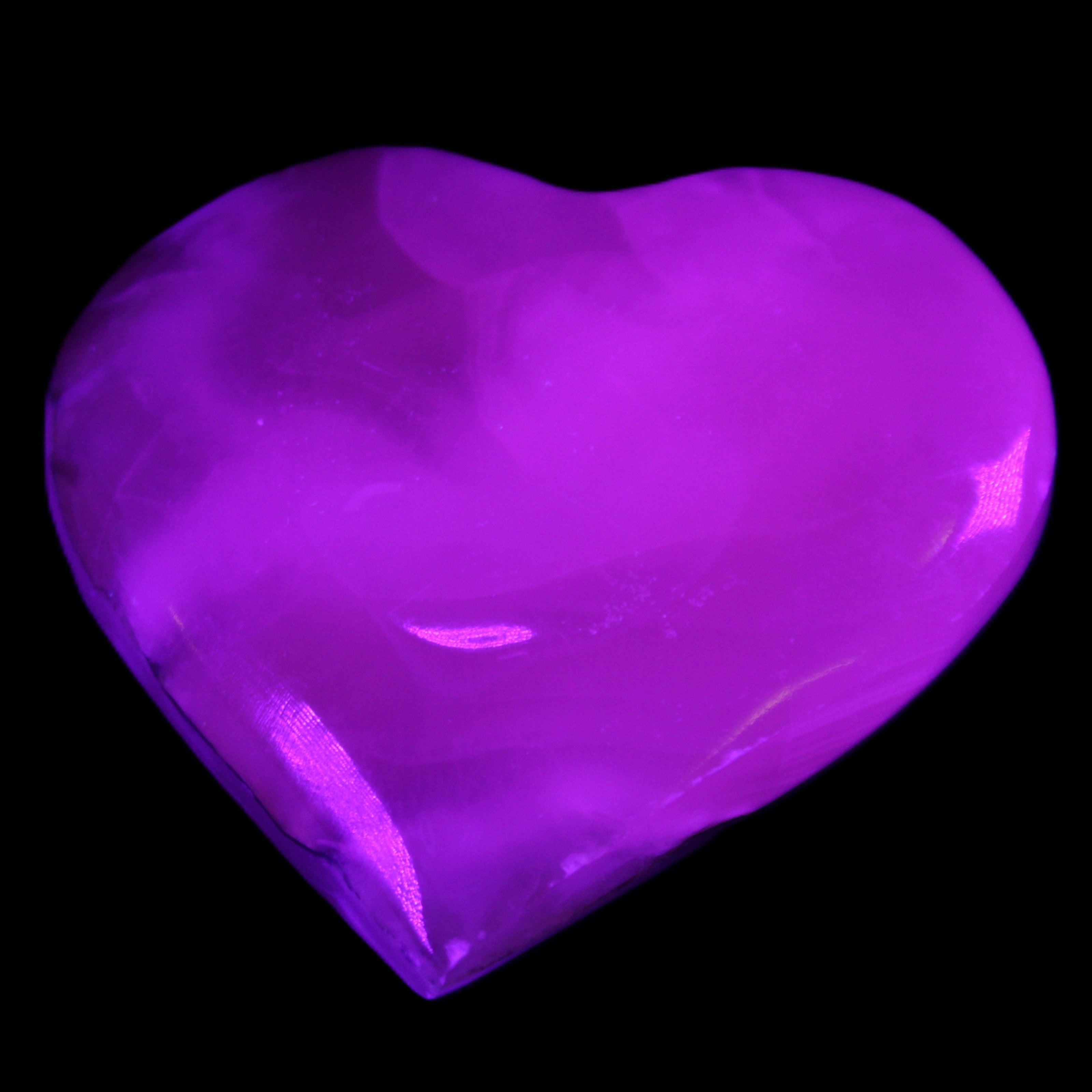 Mangano Calcite hand-carved heart 66/67*64/70mm 130-136g in sunlight - Rocks and Things Store