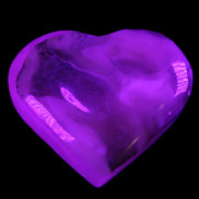 Mangano Calcite hand-carved heart 66/67*64/70mm 130-136g in sunlight - Rocks and Things Store