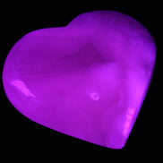 Mangano Calcite hand-carved heart 66/67*64/70mm 130-136g in sunlight - Rocks and Things Store