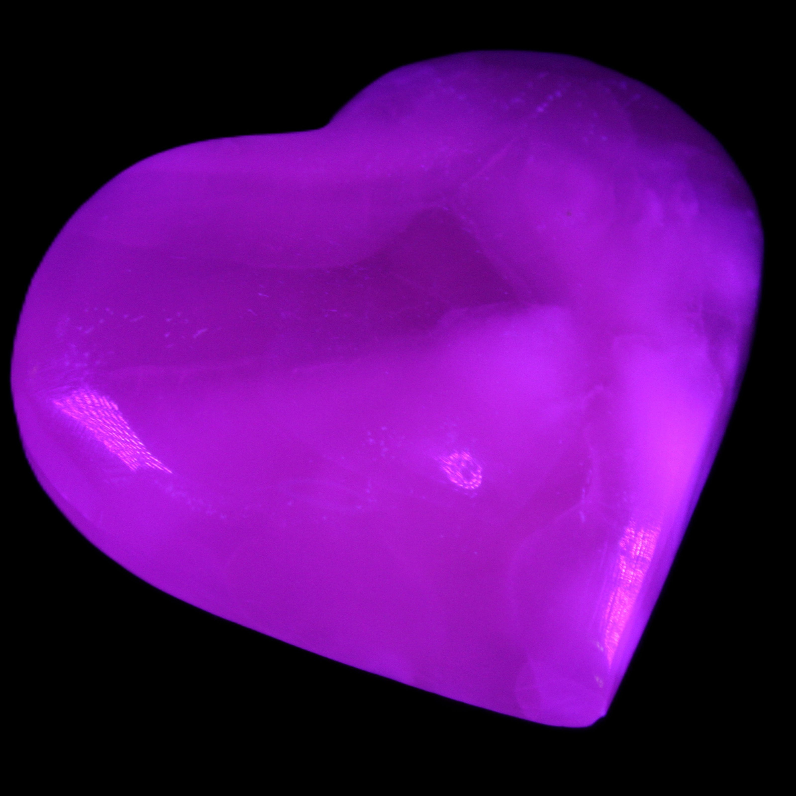 Mangano Calcite hand-carved heart 66/67*64/70mm 130-136g in sunlight - Rocks and Things Store