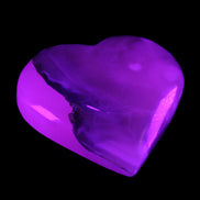 Mangano Calcite hand-carved heart 66/67*64/70mm 130-136g in sunlight - Rocks and Things Store