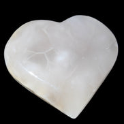 Mangano Calcite hand-carved heart 66/67*64/70mm 130-136g in sunlight - Rocks and Things Store