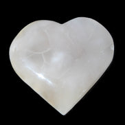 Mangano Calcite hand-carved heart 66/67*64/70mm 130-136g in sunlight - Rocks and Things Store