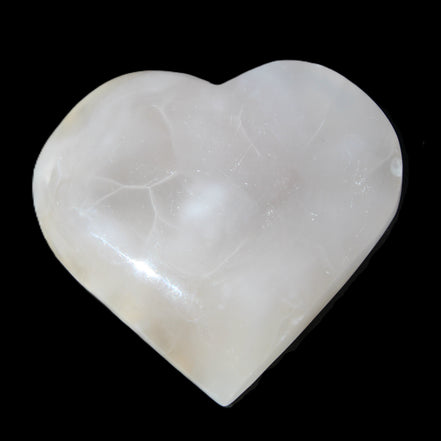 Mangano Calcite hand-carved heart 66/67*64/70mm 130-136g in sunlight - Rocks and Things Store